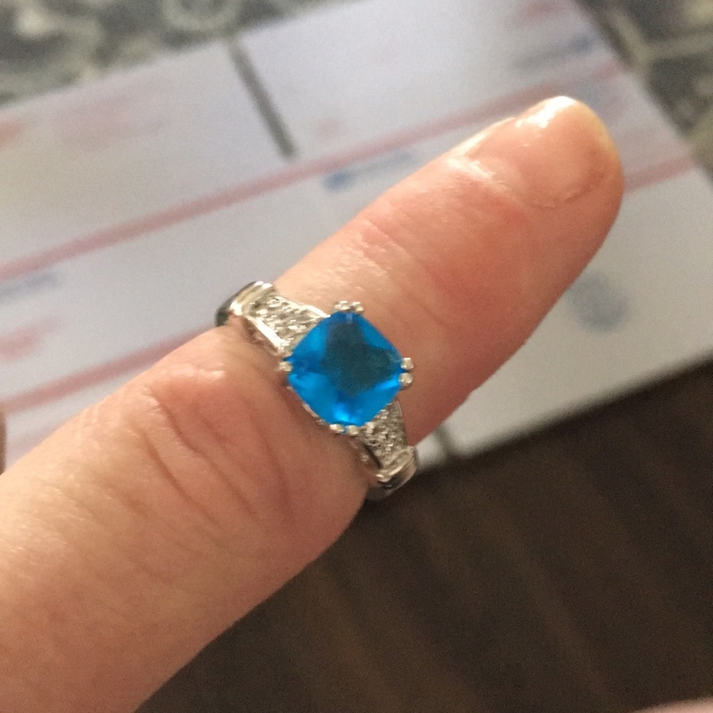 Silver metal ring with a beautiful blue stone